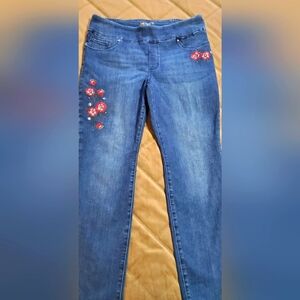 Lee Women's Blue Jeans with Red Floral Accents.